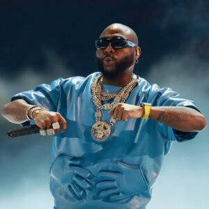 Davido speaking during a livestream interview, discussing his music career and possible government role, referencing Michel Martelly.