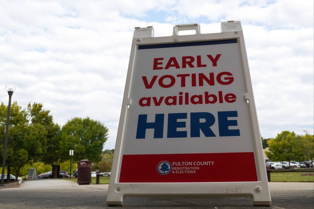 Georgia reports record turnout as early voting begins in US battleground state