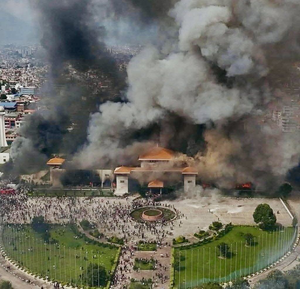 Protesters set Nepal parliament on fire