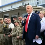 US President Donald Trump boards Air Force One as the United States announces sanctions against a Nigerian national and three firms over alleged ISIS financing links.