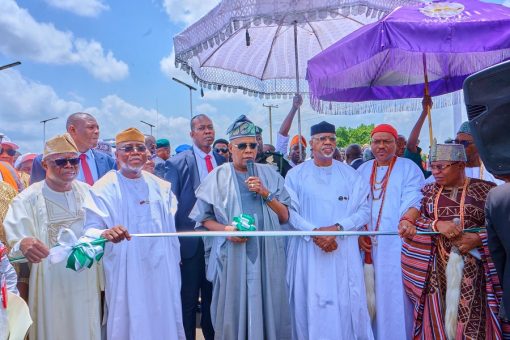 Governor Lucky Aiyedatiwa speaking during the commissioning of the Reuben Fasoranti Flyover in Akure attended by Vice President Kashim Shettima.