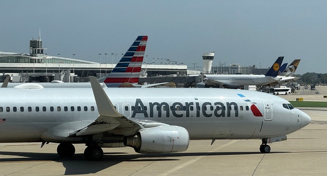 Passengers at a US airport as authorities begin Ebola health screening for travellers from affected African countries.