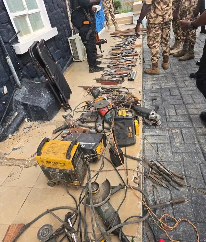 Recovered fabricated AK-47 rifles and weapon-making equipment displayed after a security raid in Plateau State.