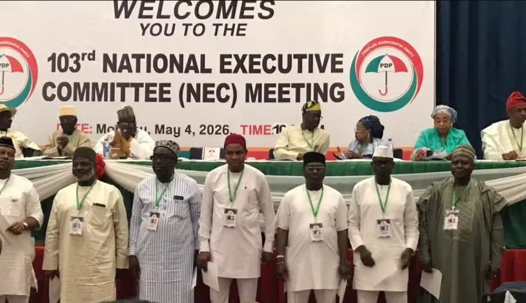 Turaki-led PDP faction members during a special convention in Abuja announcing Goodluck Jonathan as presidential candidate amid alleged venue blockade controversy.