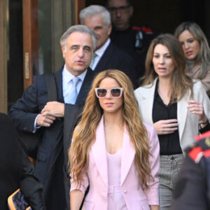 Shakira leaves court in Barcelona during earlier tax fraud proceedings in Spain.