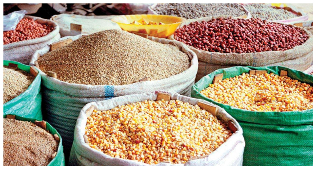 Food items including eggs, beans, rice and onions displayed in a Nigerian market as prices rise in March 2026.