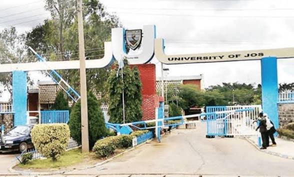 UNIJOS students protesting on campus over prolonged electricity outage in hostel facilities.