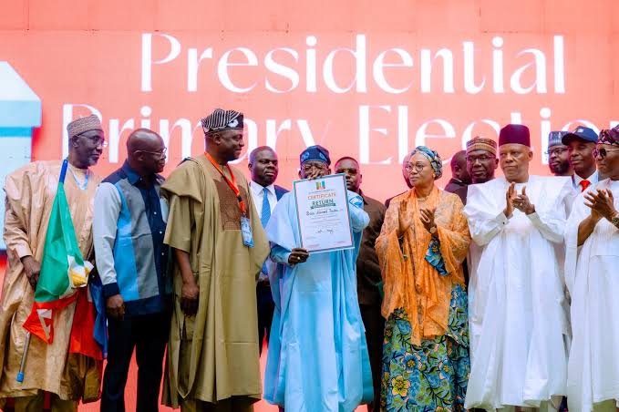 President Bola Ahmed Tinubu receives APC certificate of return after winning the party’s 2027 presidential primary election in Abuja.