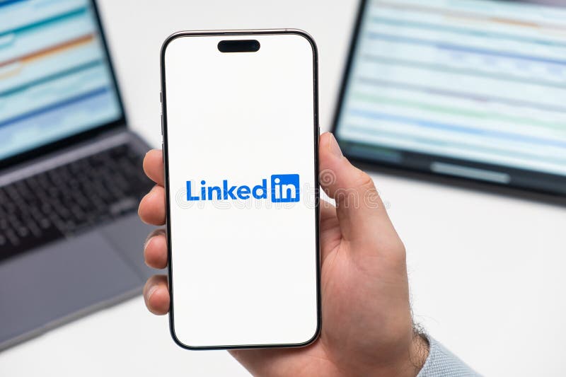 LinkedIn logo on smartphone screen representing data privacy complaint in Austria
