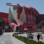 Police investigators examine a vehicle near a stadium in Tijuana, Mexico, after a body was discovered close to Iran’s World Cup training base.