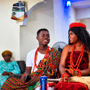 Peller and Jarvis smiling during traditional wedding ceremony while speaking in a light emotional exchange shared online.