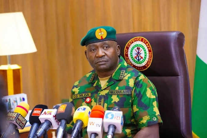 Defence Minister Christopher Musa, represented at a security summit in Abuja, announcing plans to embed journalists with military units during selected operations.