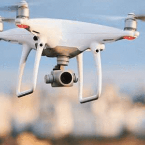 A conceptual illustration of drone surveillance and AI monitoring over Nigeria’s border regions, showing digital mapping, sensors and security command centres.