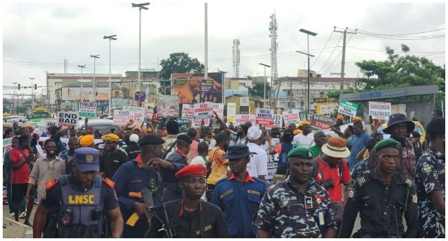 Protesters in Lagos holding placards during EndBadGovernance demonstration calling for action on insecurity, hardship and economic reforms.