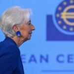 ECB President Christine Lagarde speaking at a press conference in Frankfurt announcing interest rate increase amid rising eurozone inflation pressures.