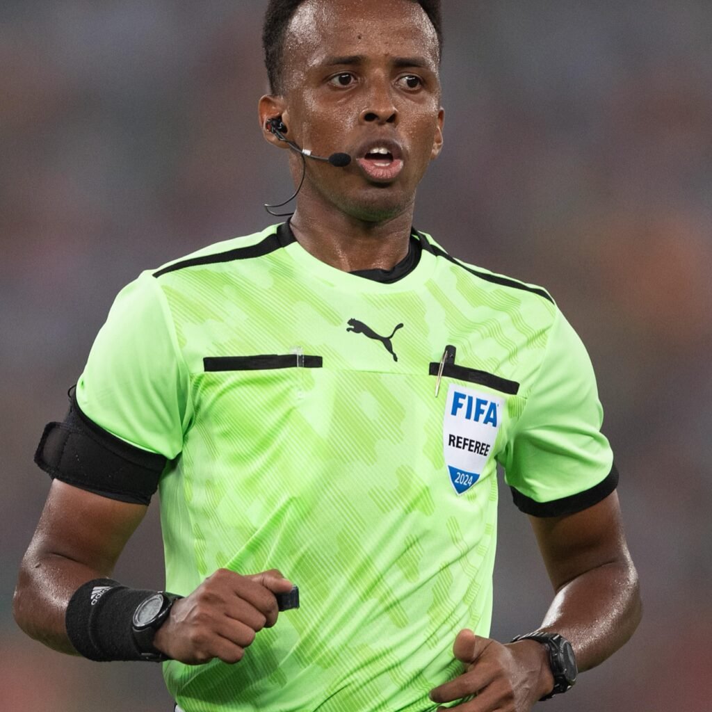 Somali referee Omar Abdulkadir Artan during a match, following UEFA appointment amid previous US visa denial controversy.