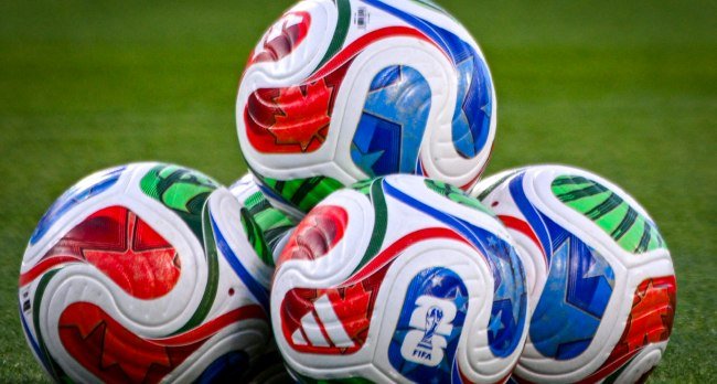 Iranian national football team preparing for travel amid geopolitical tension and military activity reported between US and Iran in the Middle East.