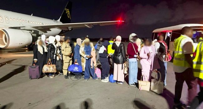 Nigerian migrants evacuated from Libya arrive at Murtala Muhammed International Airport in Lagos under an IOM-assisted voluntary return programme.