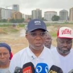 Lagos Environment Commissioner Tokunbo Wahab inspecting drainage infrastructure during an enforcement visit to flood-prone communities in Lagos.