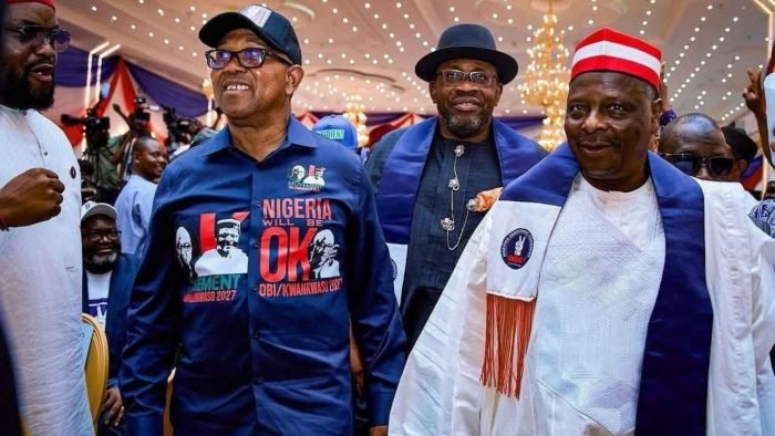 Peter Obi and Rabiu Musa Kwankwaso pictured at an NDC convention in Abuja during discussions on party anti-defection policy exemption.