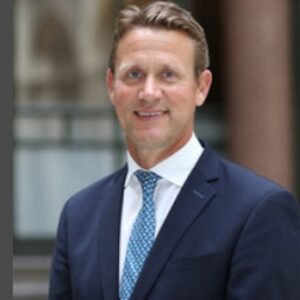 Peter Vowles, UK diplomat appointed as new British High Commissioner to Nigeria, standing in formal portrait photo.