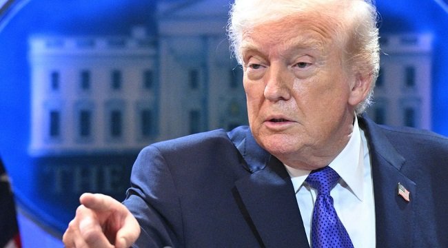 Donald Trump addressing reporters amid claims of a US military helicopter being shot down over the Strait of Hormuz during tensions with Iran.