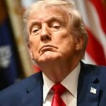 US President Donald Trump addressing reporters in the White House briefing room during a statement on the US-Iran peace agreement announcement.