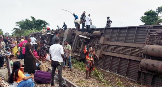 Emergency responders at the scene of a derailed Warri–Itakpe passenger train in Delta State, Nigeria, following a fatal rail accident.