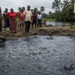 Gas bubbles rising from a water surface in Bille community, Rivers State, where residents report ongoing toxic gas seepage.