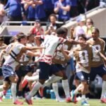 USA players celebrating a goal against Australia during their 2-0 World Cup 2026 victory in Seattle.