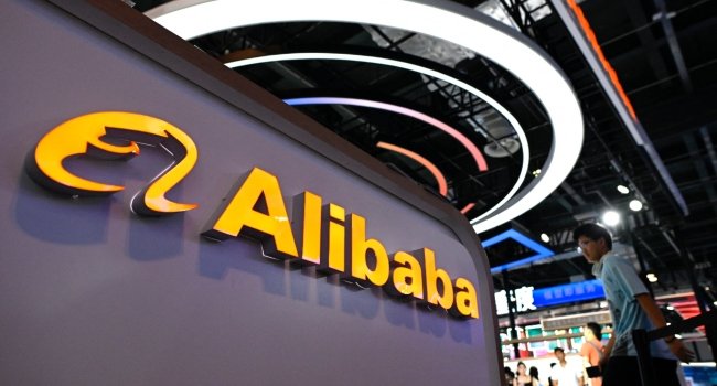 Alibaba logo displayed during the World Artificial Intelligence Conference in Shanghai as the company challenges a Pentagon blacklist designation in US court.