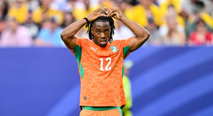 Ivory Coast striker Elye Wahi in action during a World Cup match, amid visa denial linked to a French match-fixing investigation.