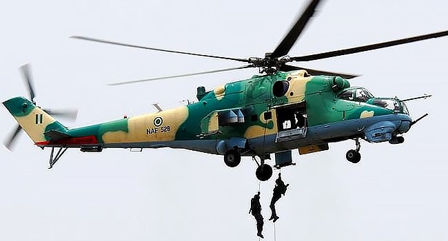 Military aircraft involved in counter-terrorism operations over northern Borno State during an air strike targeting suspected ISWAP fighters and vehicles.