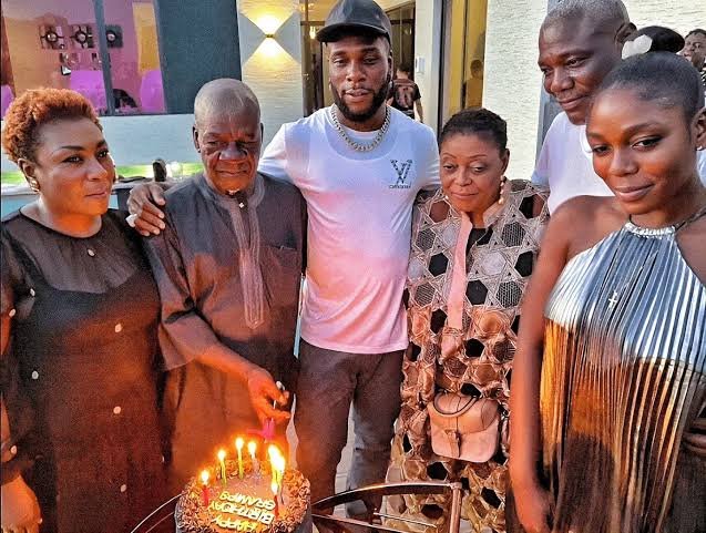 Burna Boy at the 90th birthday celebration in Lagos honouring his grandfather Benson Idonije during a family event.
