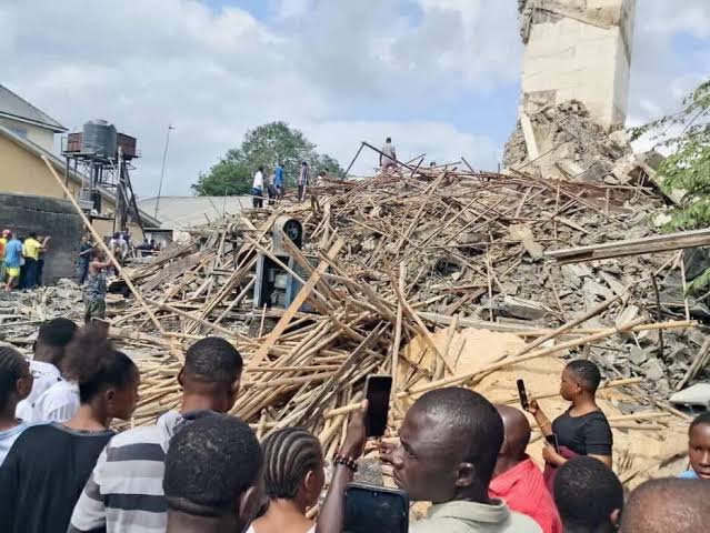 Rescue workers and emergency responders search through the rubble of a collapsed building under construction on Odili Road in Port Harcourt, Rivers State, after one person died and three others were rescued.
