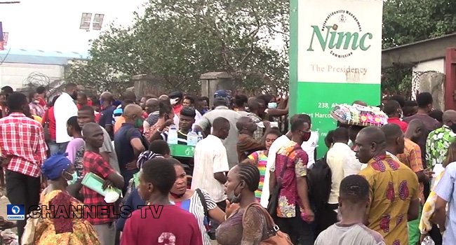 Applicants at a NIMC enrolment centre as the commission warns Nigerians against a fake online NIN correction portal scam.