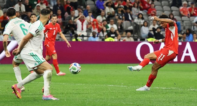Switzerland players celebrate after scoring during their 2-0 World Cup victory over Algeria in Vancouver.