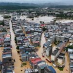 Rescue teams respond after deadly storms and flooding caused widespread destruction in central and southern China.