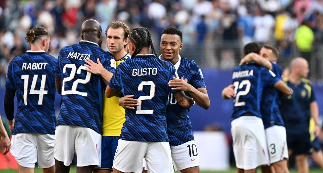 France forward Kylian Mbappe celebrates with teammate Malo Gusto during the FIFA World Cup 2026 as France prepare to face Morocco in the quarter-finals.
