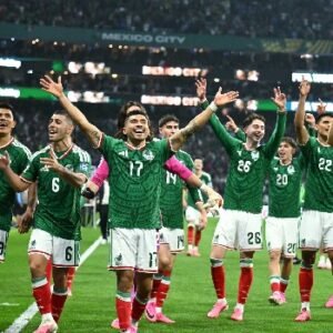 Mexico players celebrate after defeating Ecuador 2-0 in their FIFA World Cup 2026 round of 32 match at the Azteca Stadium.