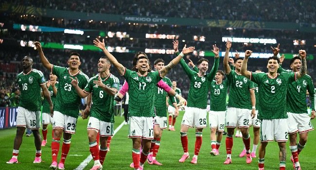 Mexico players celebrate after defeating Ecuador 2-0 in their FIFA World Cup 2026 round of 32 match at the Azteca Stadium.
