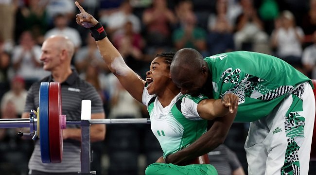 Esther Nworgu celebrates after winning Nigeria's first gold medal in the women's lightweight para powerlifting event at the 2026 Commonwealth Games in Glasgow.