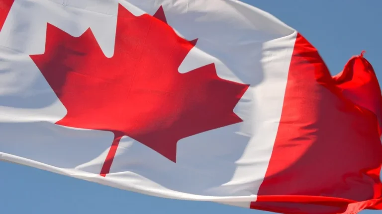 Canadian flag representing Canada's updated citizenship by descent rules for people born outside the country.