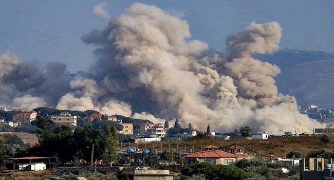 Smoke rises in the Middle East amid renewed US-Iran tensions over the Strait of Hormuz.
