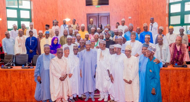 Governor Dikko Radda receiving PDP and ADC defectors into the APC at the Katsina Government House