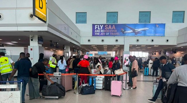 Passengers and aircraft at a Nigerian airport as Airline Operators of Nigeria warn unions against disrupting flight operations over alleged Ticket Service Charges dispute.