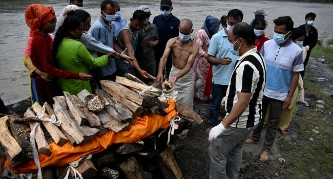 Nepal flood victim Ayush Khadka’s body is cremated as families mourn victims of devastating flash floods in Chitwan, Nepal