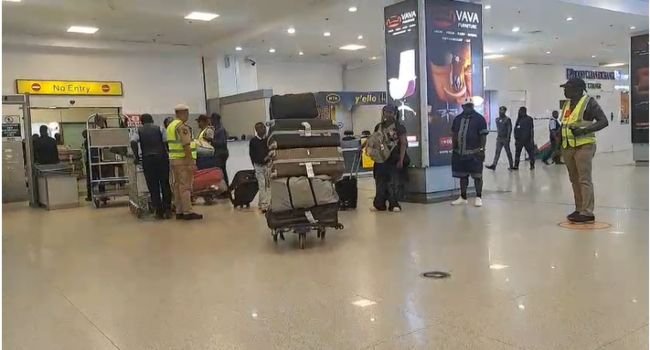 67 Nigerian returnees from South Africa arrive at Murtala Mohammed International Airport in Lagos.