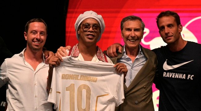 Ronaldinho holds a Ravenna FC jersey during the Italian club's team presentation in Marina di Ravenna.