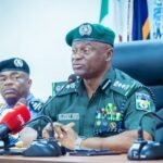 Inspector-General of Police (IGP) Tunji Disu speaking at a youth leadership and security dialogue in Abuja.